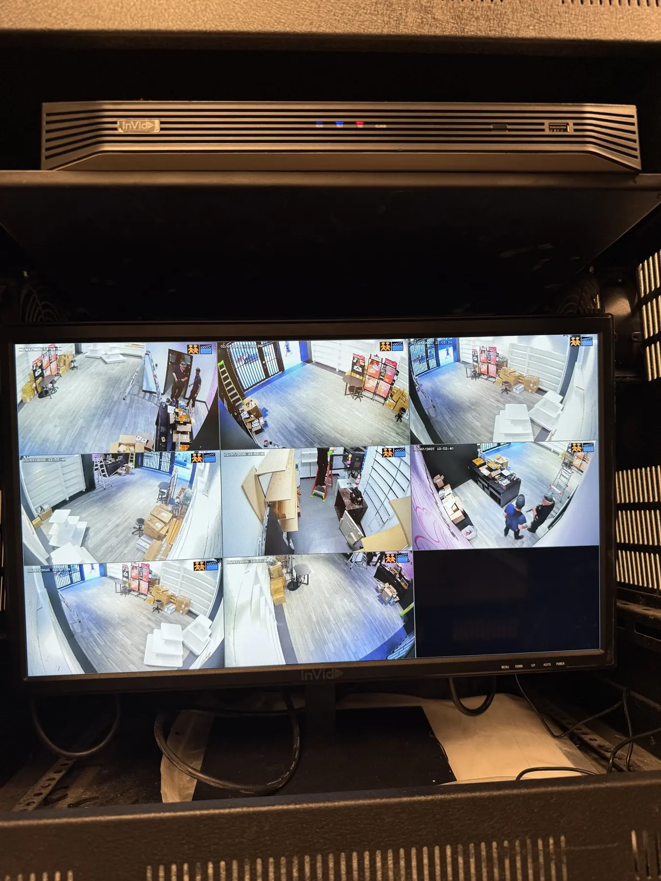 Nine camera views on a monitor at a commercial site